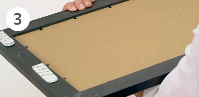 Command Picture Hanging Strips on the photo frame
